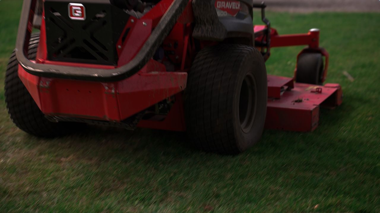 Red Gravely commercial zero-turn mower on freshly cut grass